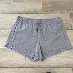 Athleta Baja Shorts 14 Gray Laser Cut Drawstring Pockets 4" inseam unlined